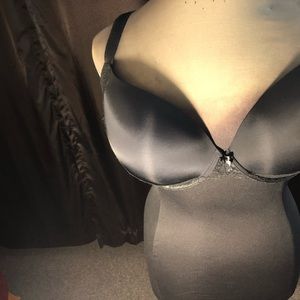Torrid 42F black with lace trim and back push up plunge bra.